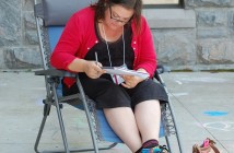 Tena Laing takes advantage of gorgeous weather to make notes outdoors