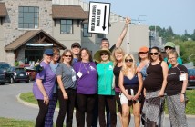Happy writers post-creativity walk. From left, Janet Nichols, Paula Mazzocchi, Jennifer Turney, Drew Hutcheson, Karen Wehrstein, Lori Twining, Kevin Craig (holding sign), Sue Kenney, Naomi Mesbur, Tena Laing, Shellie Westlake, Emma Hogg, Lauren Flattery