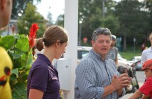 Mayor Scott Aitchison addresses the crowd as Town of Huntsville sustainability coordinator Rebecca Francis looks on