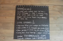 A menu board at the Totem Juice Company juice bar