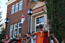 Suzuki School of Music students play on the steps of Town Hall