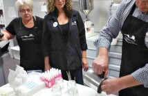 Mayor Scott Aitchison tries his hand at candlemaking at Soapstones. Photo by Teri Souter.