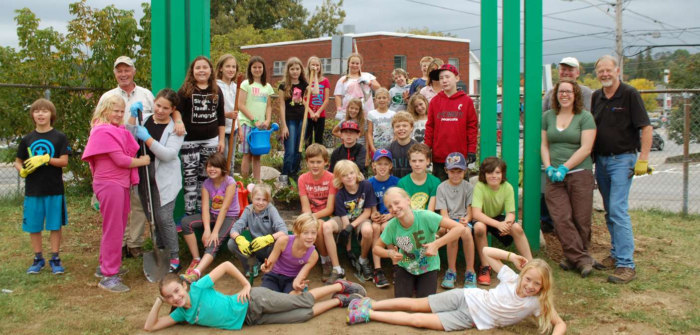 Huntsville Public School students in front of their new butterfly garden