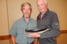 Roy with Dave Standfield. Dave was commissioned by the Friends of the Dwight Library to carve the canoe Roy is holding as a gift for his presentation at the library.
