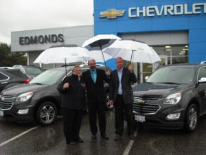(From left to right) Wendy McConnell, Ward Edmonds, Richard Janssen pose with the vehicles one week before the beginning of the tournament