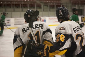 Kyle Burns leads the league in points by a defenseman while Andy Baker leads in overall scoring