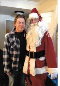 Never too old to put your arm around Santa (with Grant Nickalls)