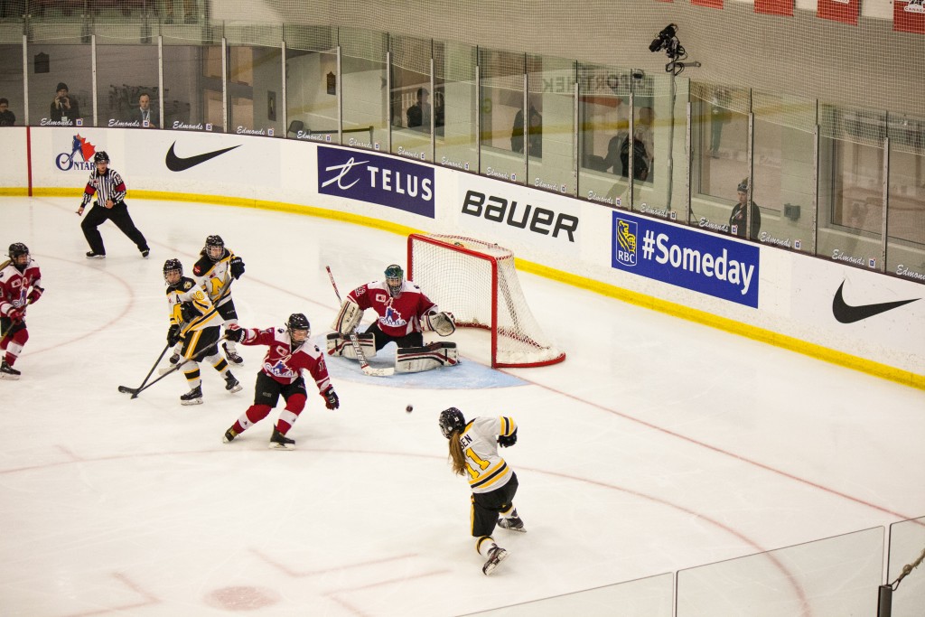 Kayla Friesen fires a shot on goal in the third period of the gold medal game on Sunday