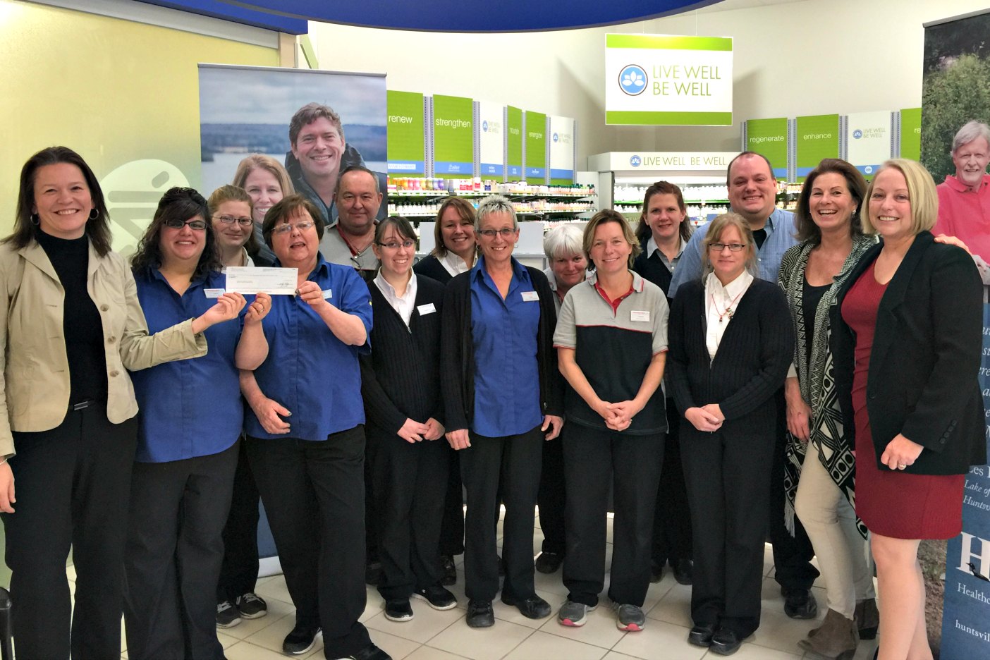 Huntsville Shoppers Drug Mart staff present a cheque to Britta Gerwin, far left, and Katherine Craine, far right, of the Huntsville Hospital Foundation
