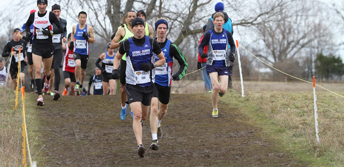 Troy Cox (front, left) and Chris Watson (right) both finished in the top 20 of all Masters runners in Canada and top five in their age category