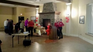 Host Welcoming Committee Chair Wendy McConnell (podium left) and Volunteer Chair Lindsay Fetterley-Coles (podium right) thank the many volunteers during the post-tournament celebration party