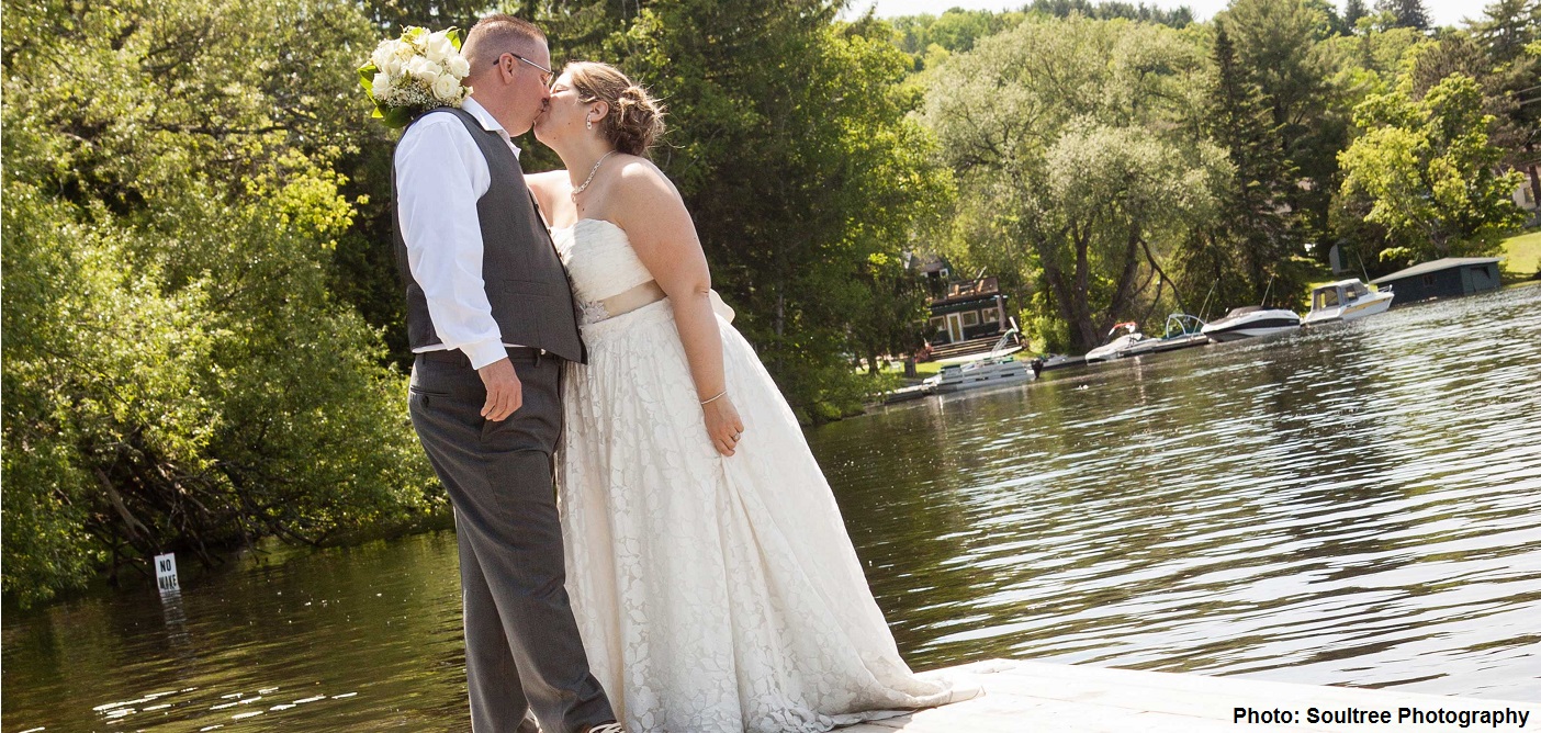 The Muskoka River provides a serene backdrop for wedding photos. Credit: Soultree Photography