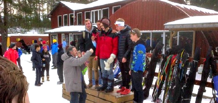 The Hoyas Senior Boys Nordic team accept gold medals. Photo: Jim Baumgart.