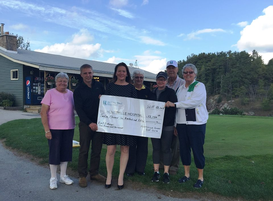 (From left) Patsy Tousignant, Michael Churchman, Britta Gerwin (HHF), Vicki Hill, Pat Thompson, Gary Hollo, and Debbie Lindsay with a cheque for funds raised at the Earl Laberge 2nd Annual Golf Tournament in support of HHF. The 3rd annual is set for Friday, September 16, 2016.