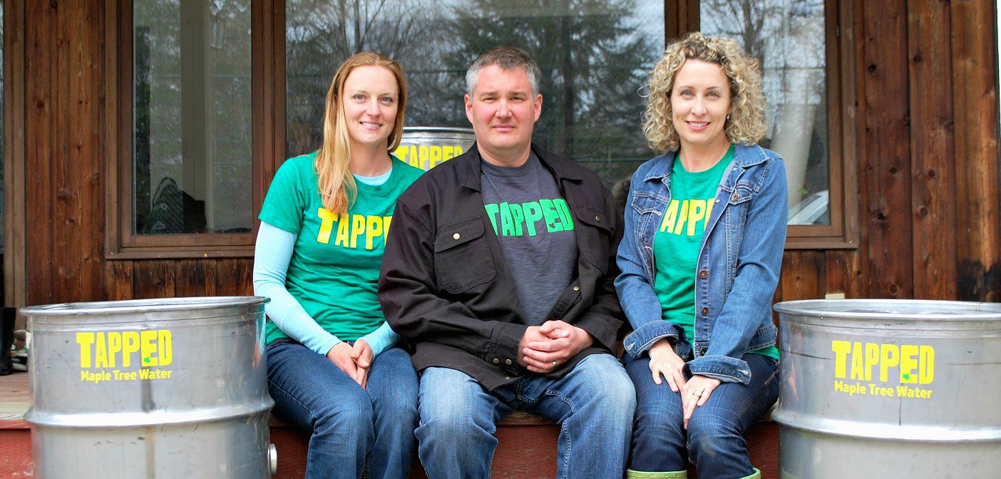 TAPPED founders (from left) Carolyn Croxall, Todd Croxall, and Kyra Watters