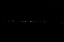 Boats line up to watch the fireworks at Dwight Firefest