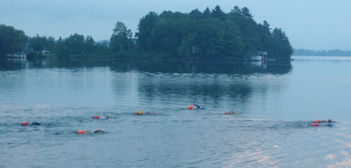 Early morning swimmers head out into Fairy Lake
