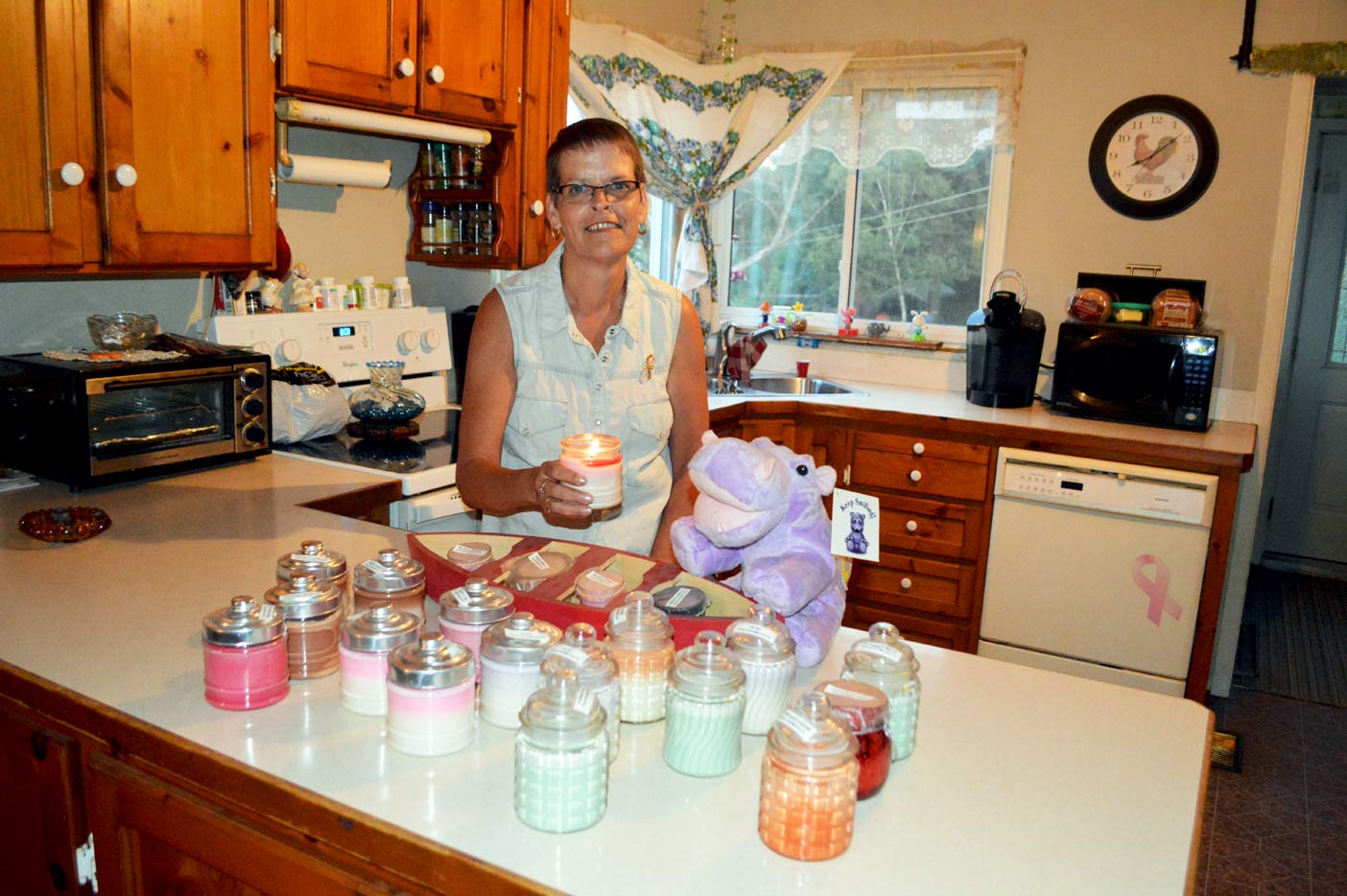 Bonita in her kitchen where her all-natural candles are made.