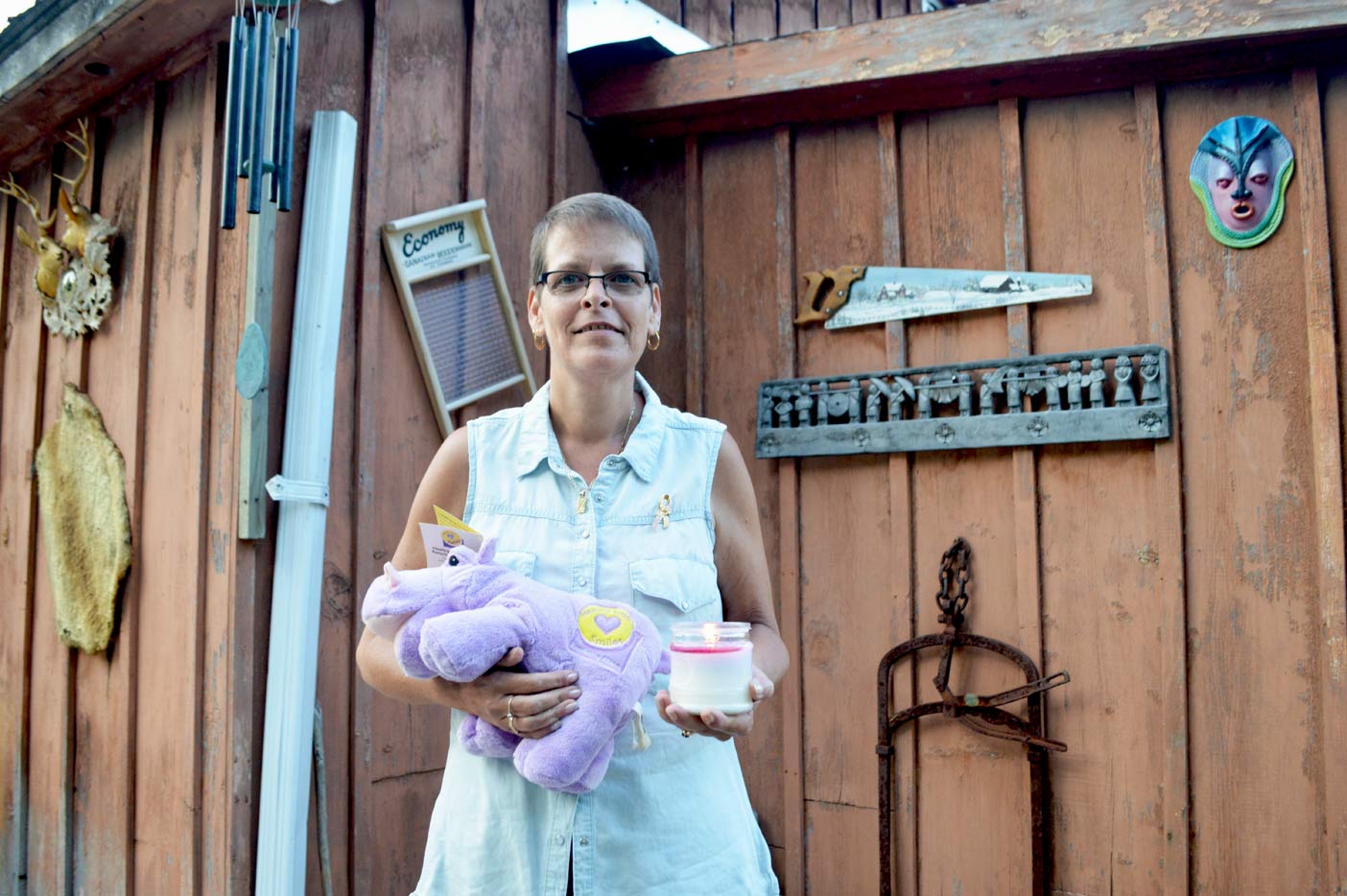 The toy hippo Bonita holds is near and dear to her heart. It's given to cancer patients to help them smile through their battle with the disease. 