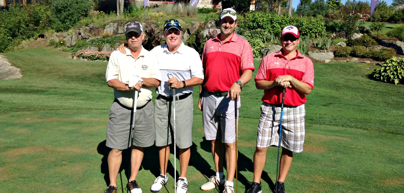 (From left) Tom Flagler and Bob Finlay of Deerhurst with Paul MacKay and Darrin Gray of Grandview.