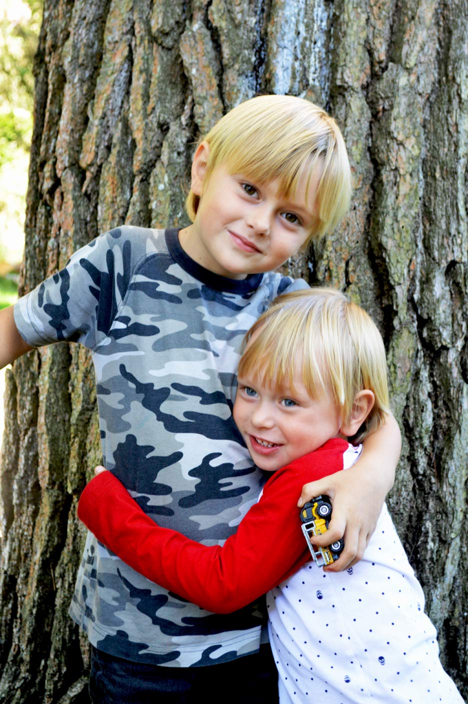 They might fight and hit and argue but that's just what some brothers do. Emrys (the little guy on the left) looks to to his big brother, Archer, and I believe he always will.