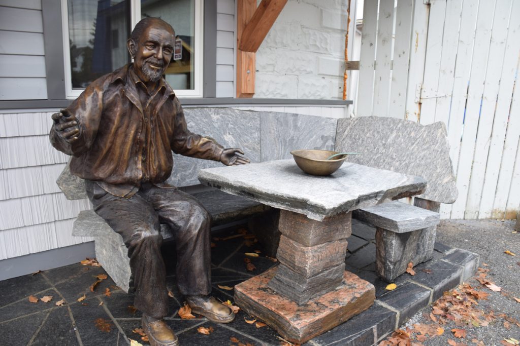 George, the bronze sculpture was created by local artist Brenda Wainman Goulet and all the stone work was done by local artist Rudi Stade.