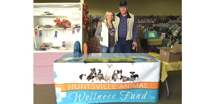 Huntsville Animal Wellness Fund board members Erin Monett (left) and David McPhee spread the word at the Huntsville Fall Fair (Photo courtesy of Huntsville Animal Wellness Fund)