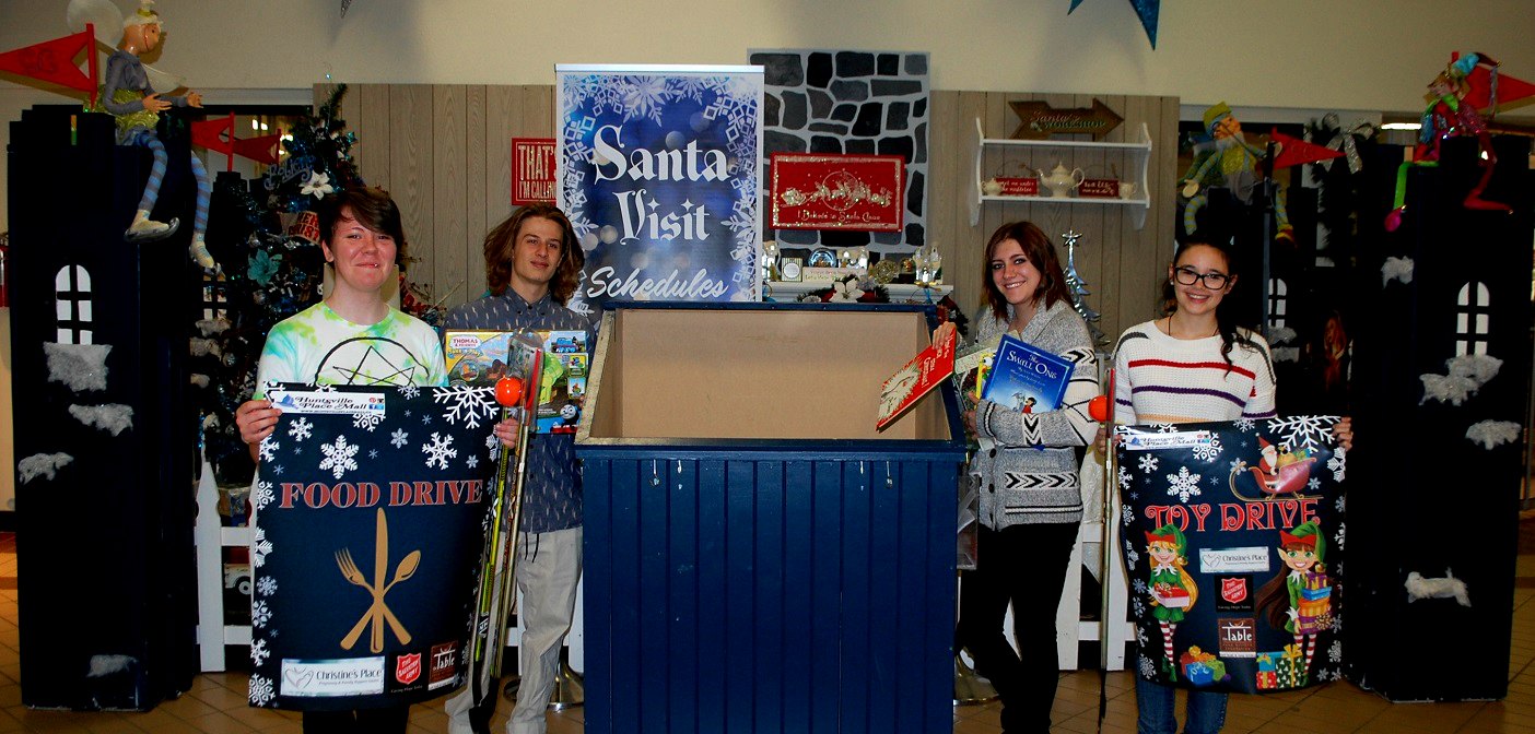 HHS co-op students (from left) Jazmyne Vermeulen, Dylan Taylor, Dakota Freeman and Tabitha Doskas want your toy and food donations (Missing: Savannah Dawe)