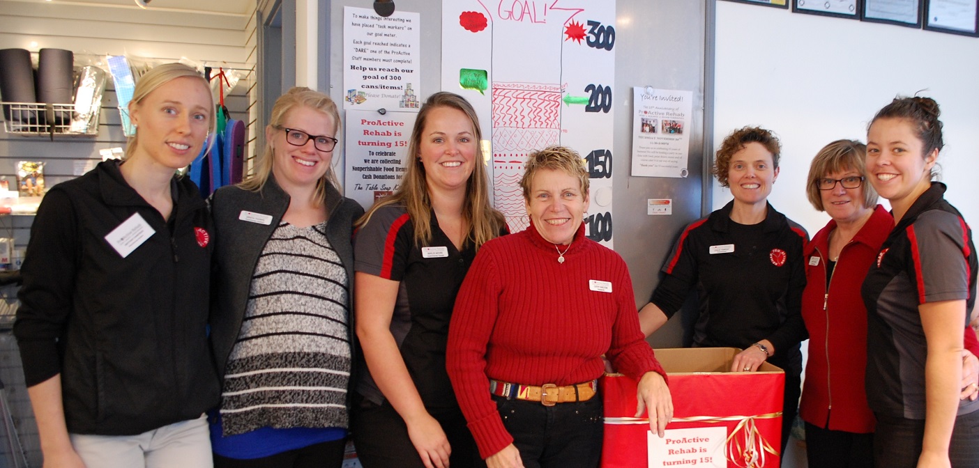 (From left) Brittany Vandyken, Krista Thorpe, Marlee Moore, Cathy Shelton, Leslie Tempest, Janet Srutwa, and Stacey Van Schyndel are quickly approaching their goal of 300 non-perishable donations