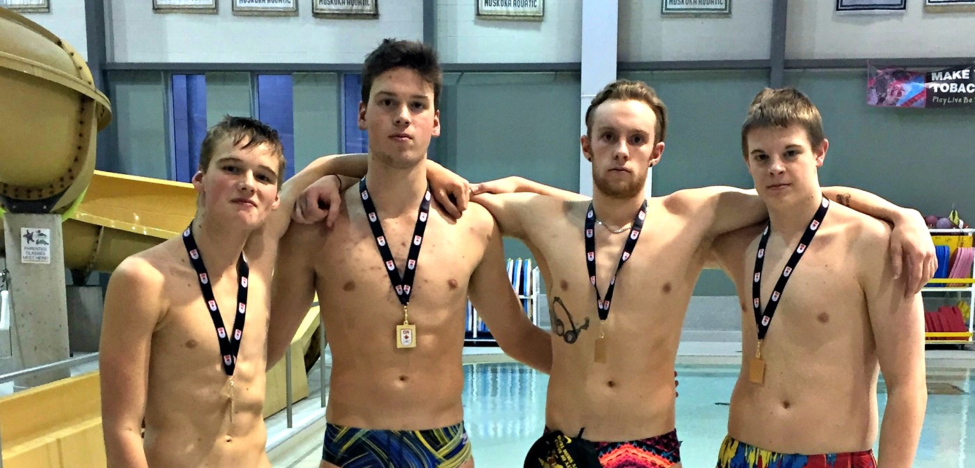The MUSAC senior boys with their 17-and-over medley relay gold medals (from left): Mark Cox, Mitch Cox, Samuel Kuntz, Andrew Markham (Photo: Janet Markham)