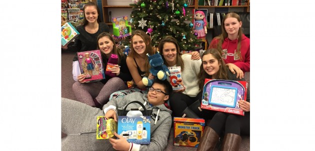 HHS WE Impact leadership group holds first successful gift drive for kids