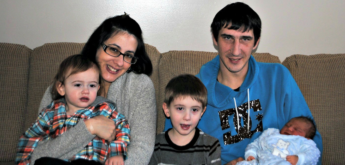 Proud parents Angel Blackley and David Cort and big brothers David and Branden welcome baby Christopher Cort (supplied photo)