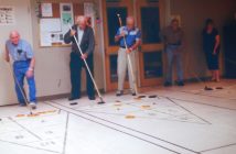 Shuffleboard is a popular activity at the club