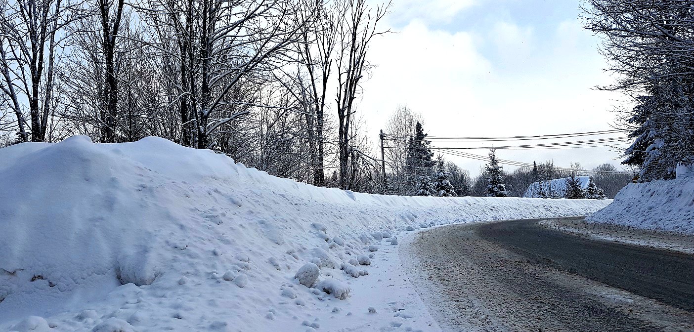 The roads in many Huntsville neighbourhoods, both urban and rural, have large snow banks thanks to excessive amounts of snow this winter