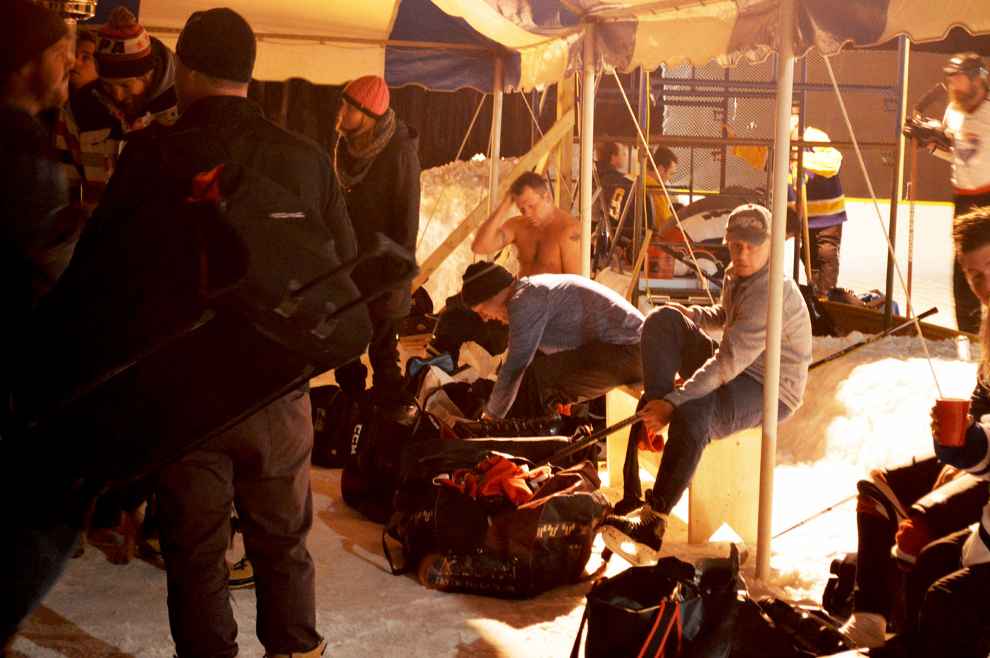 Guys taking part in the first-ever Great Northern Winter Classic lace up to hit the ice.