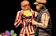 The Candyman (Greg Perras) sells Charlie a chocolate bar