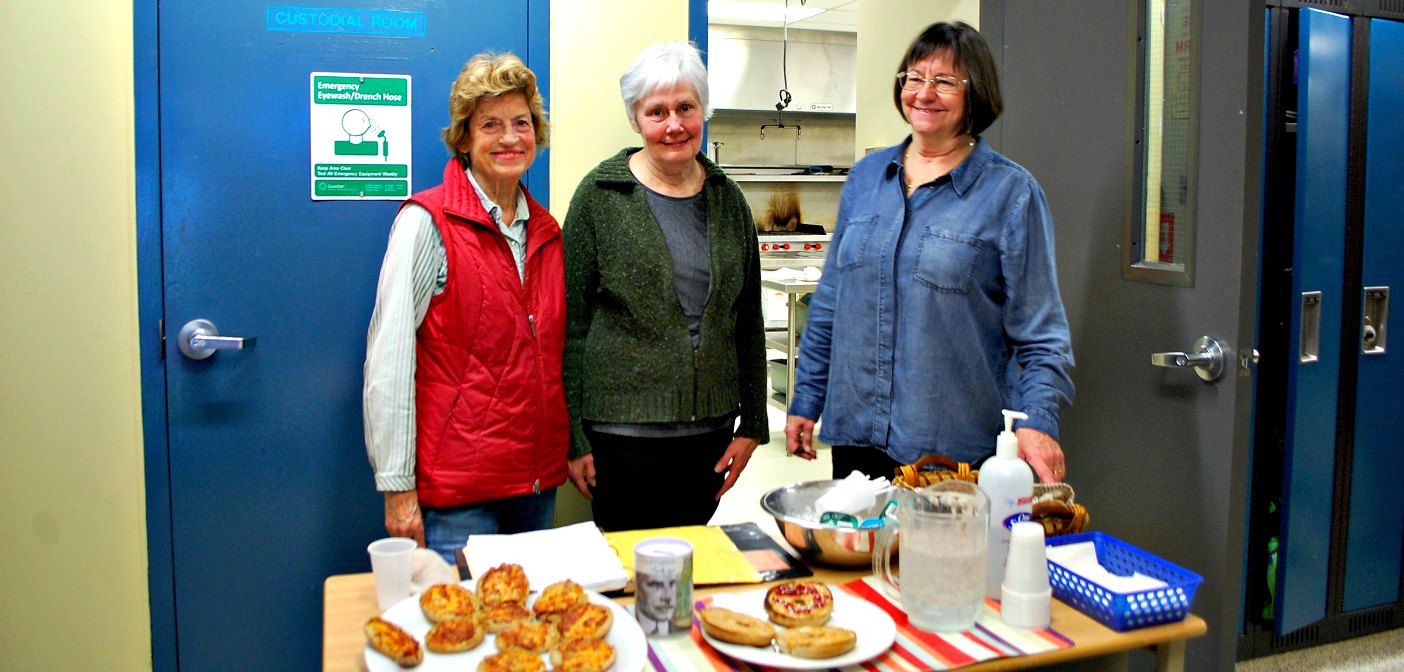 (From left) Pam Reed, Christa Valkerti and Nancy Samuell serve up breakfast Monday mornings for any student to help themselves. About 30 volunteers run the program.