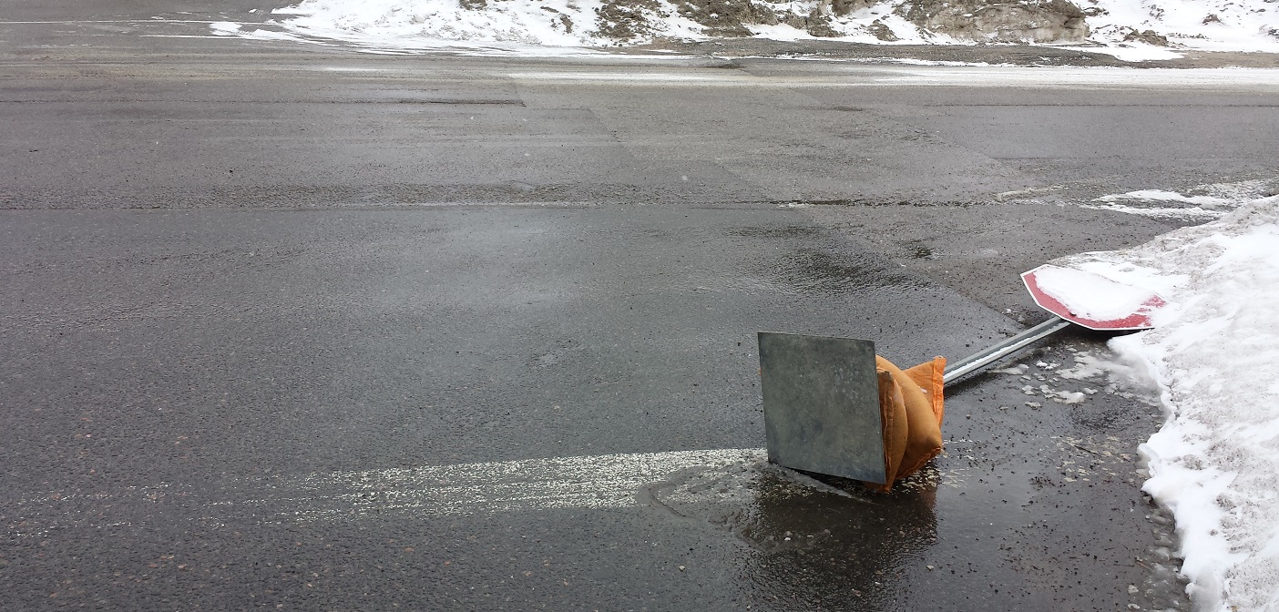 This temporary stop sign at the Scott Street exit from Shoppers Drug Mart will be replaced by a permanent sign.