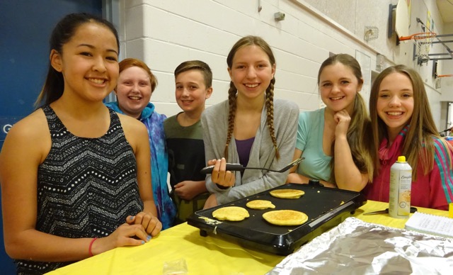 (From left) Kaylee Kelly, Mike Possel, Ian Marshall, Adrianna Card, Danielle McPherson and Ashely Nadrofsky flip their way through 75-plus pancakes.