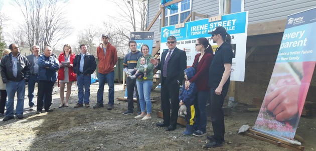 Built from the ground up with love: two families receive keys to their new Habitat homes