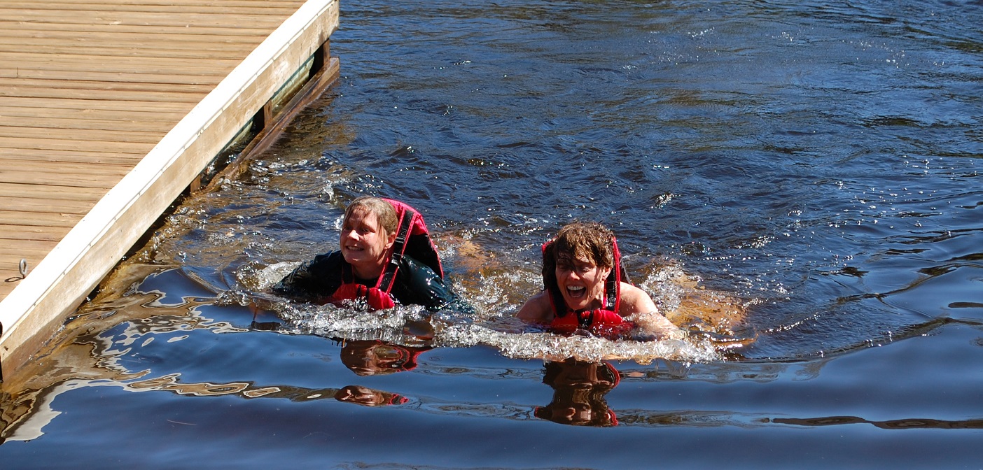 Stella Barnett (left) and Leslie Tempest were all smiles despite the chilly water for their second annual Hike for Hospice Challenge