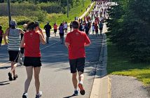 The 5K runners were the largest group with more than 800 registered. Here they head up Townline Road past Conroy Park.
