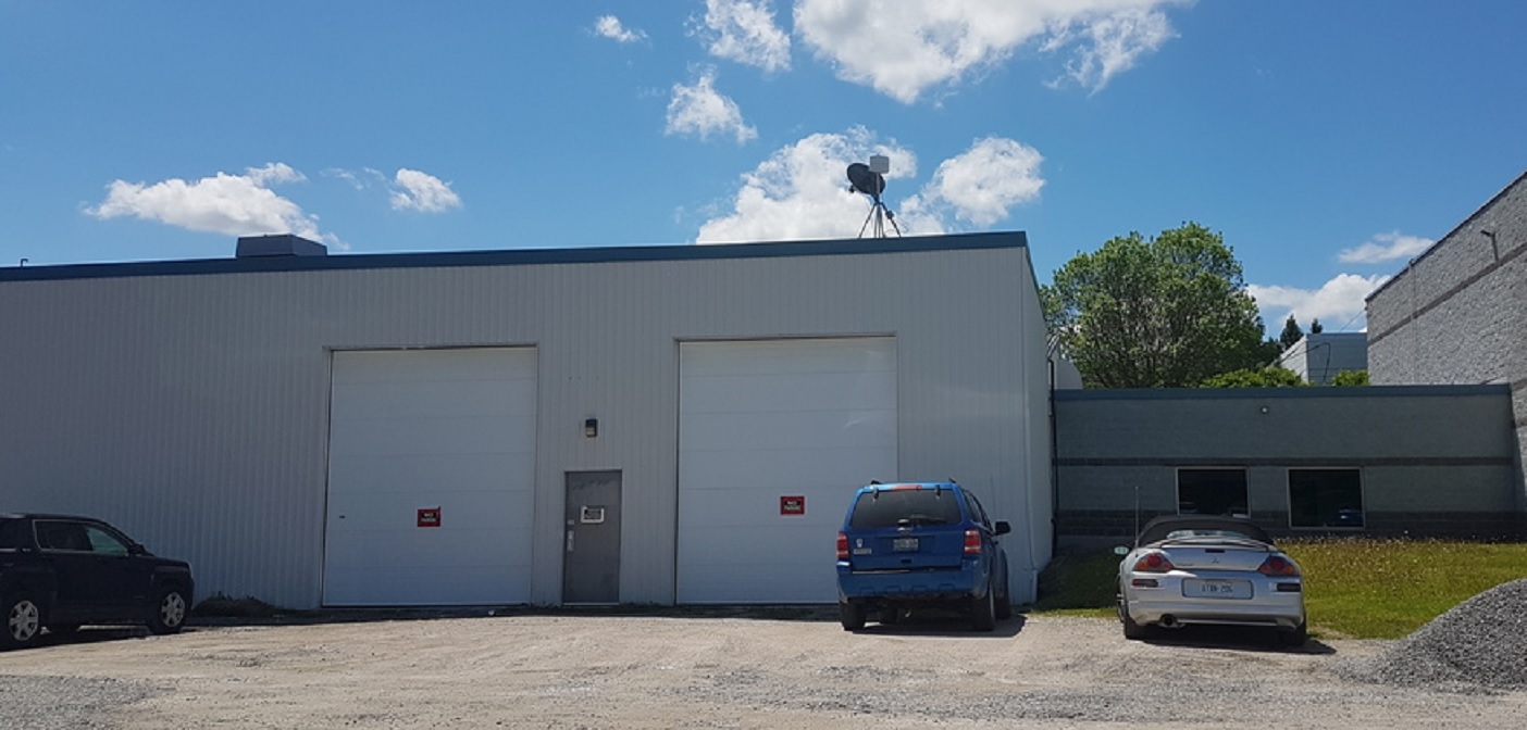 This building on Crescent Road, adjacent to but not part of the Habitat for Humanity ReStore, was searched by OPP on May 30, 2017 (Doppler photo)
