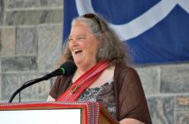 Bonny Cann, Chair of the Moon River Métis Council, greets the crowd