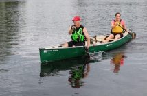 "Steve and the Fearless Females" complete their 13th and final lap with Steve Norman in the bow and Rebecca Francis in the stern.