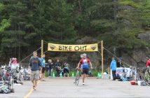 Ben Robitaille enters the transition area after the bike portion.