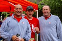 Local firefighters Paul Calleja, Shane Taylor and Brad Newberry, put teamwork to the test in the relay.