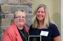 Wendy McConnell presents Tracey Robinson with the President's Award