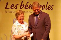 Mary McWhinnie receives an award from MPP Norm Miller for 45 years of service to the Royal Canadian Legion Ladies Auxiliary
