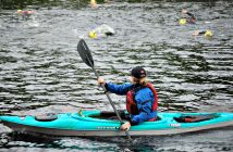 Volunteers keep a close watch to be sure none of the swimmers need assistance